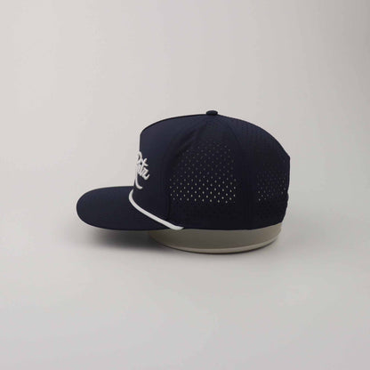 Navy Blue Golf Snapback Hat with breathable perforated polyester panels, curved brim, rope detail, and white 3D embroidery