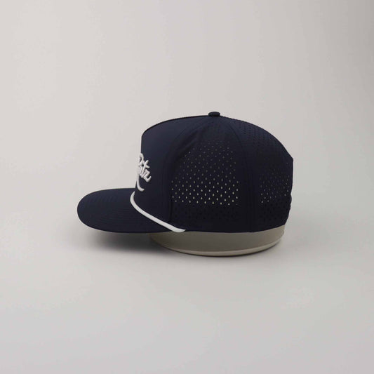 Navy Blue Golf Snapback Hat with breathable perforated polyester panels, curved brim, rope detail, and white 3D embroidery